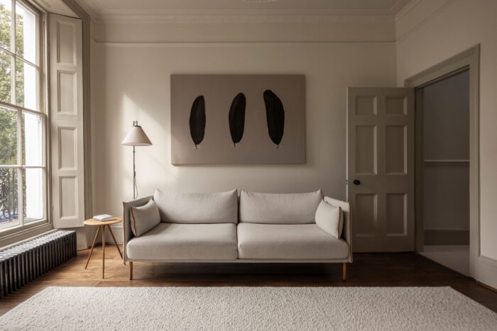 The family's living room on the first floor. Contemporary art and furnishings work well with Georgian architecture.