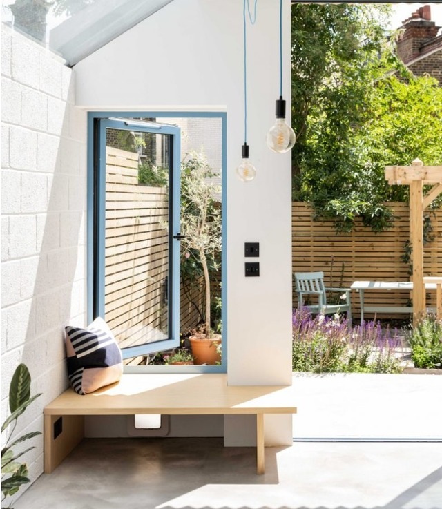 blue grey room with natural light from windows 