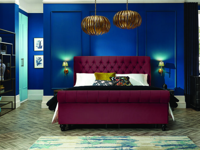 A beautiful bedroom containing an adjustable bed