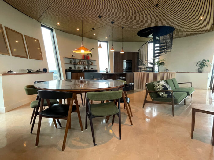 Living room at the tower with spiral staircase to the roof