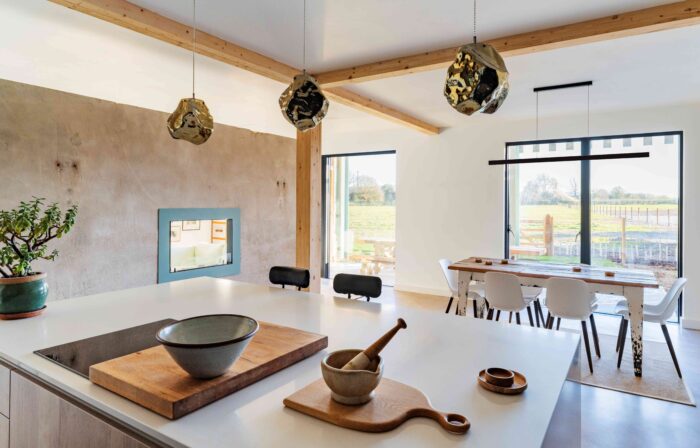 THe kitchen and dining room are open-plan and open onto the rear garden.