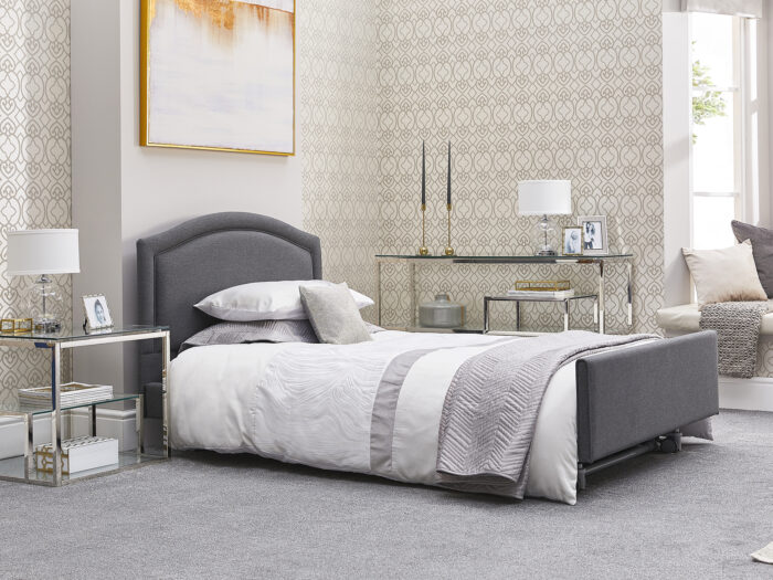 A lowered bed in a pretty bedroom